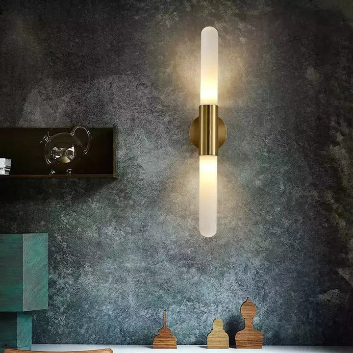 Modern Brass Wall Light with Frosted Tube Design