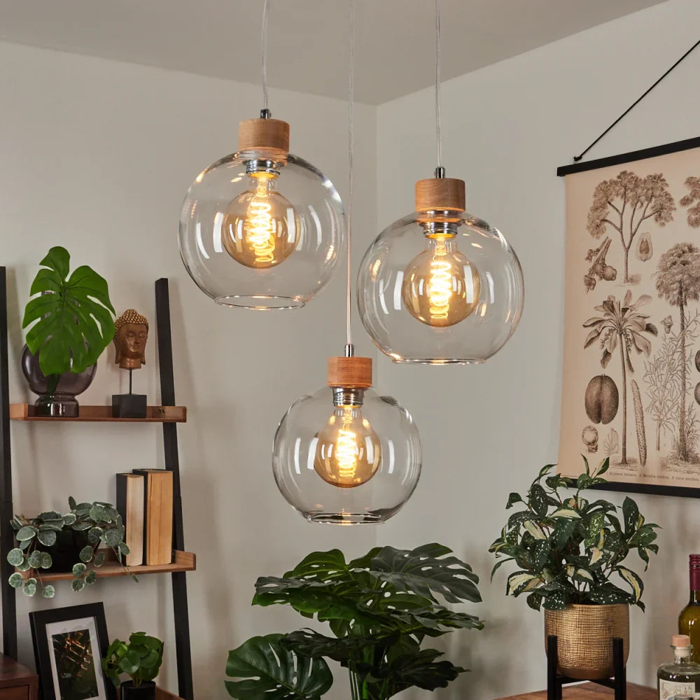 Rustic Clear Glass Globe Pendant Light Trio with Wood Accents