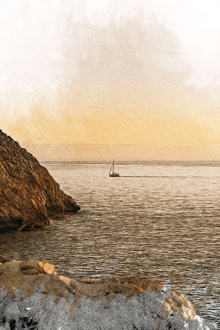 Wadi Home coastal sailboat landscape framed wall art featuring a golden sunset over a rugged shoreline in a living room.