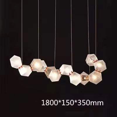 Modern Geometric Pendant LightModern Geometric Pendant Light for Dining Room (8 cells)Illuminate your dining area with this striking modern geometric pendant light, featuring a unique configuration of frosted hexagonal glass shades. Designed to add elPendant LightingWadi Home