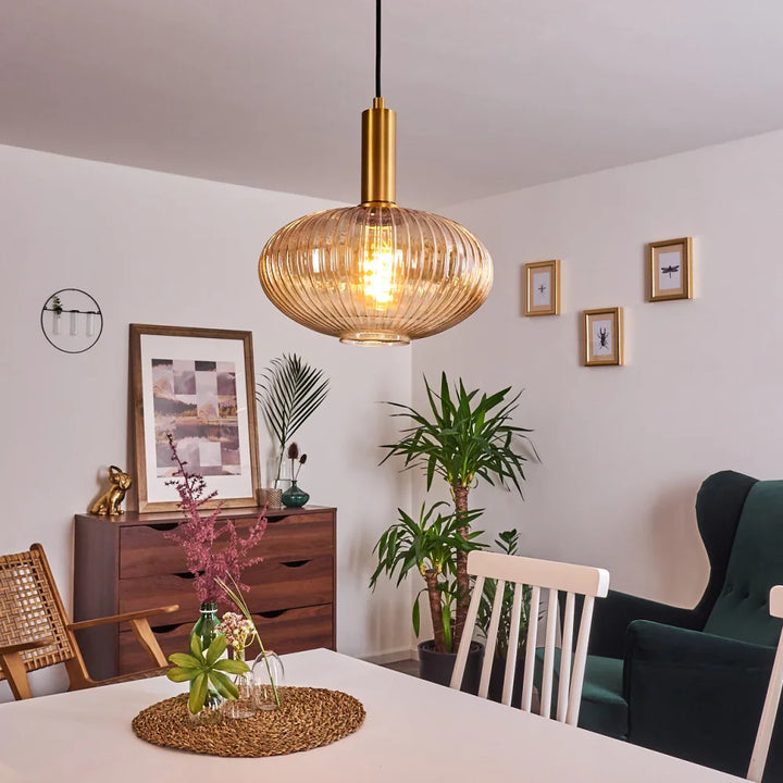 Elegant Amber Ribbed Glass Pendant Light with Brass Accents