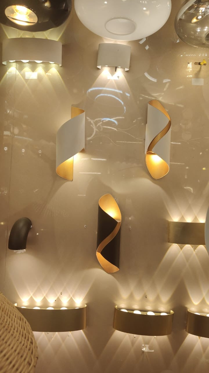 Modern LED Wall Sconce with Black and Gold Spiral Design