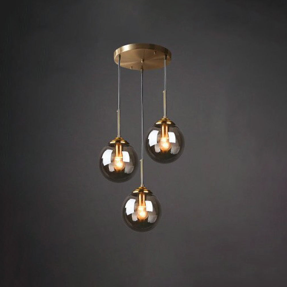 Modern 5-Light Globe Pendant Light with Smoked Glass and Brass Finish