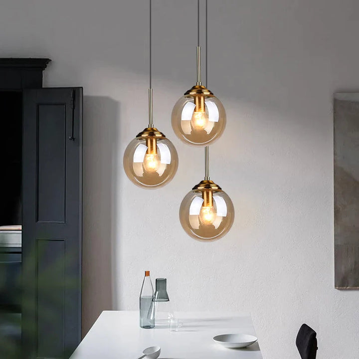 Modern 5-Light Globe Pendant Light with Smoked Glass and Brass Finish