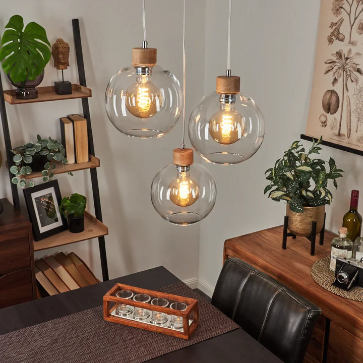 Rustic Clear Glass Globe Pendant Light Trio with Wood Accents