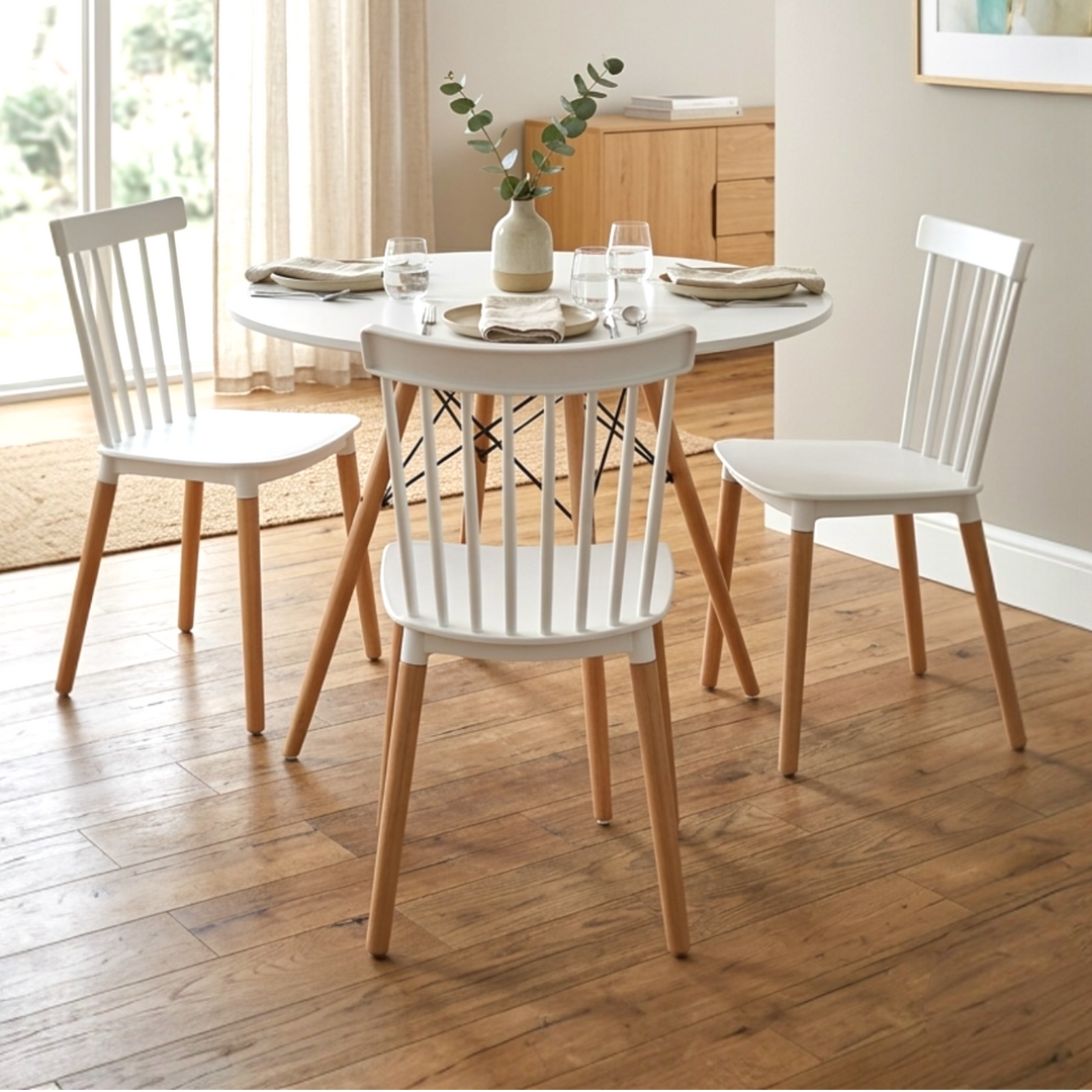 Modern dining table set with round MDF tabletop and three spindle-back beech wood chairs