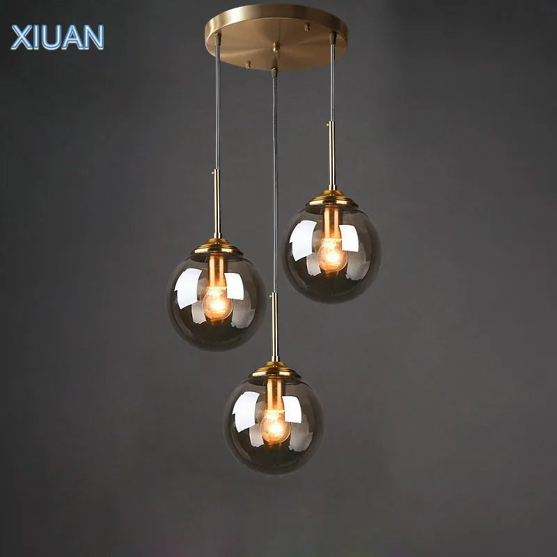 Modern 5-Light Globe Pendant Light with Smoked Glass and Brass Finish