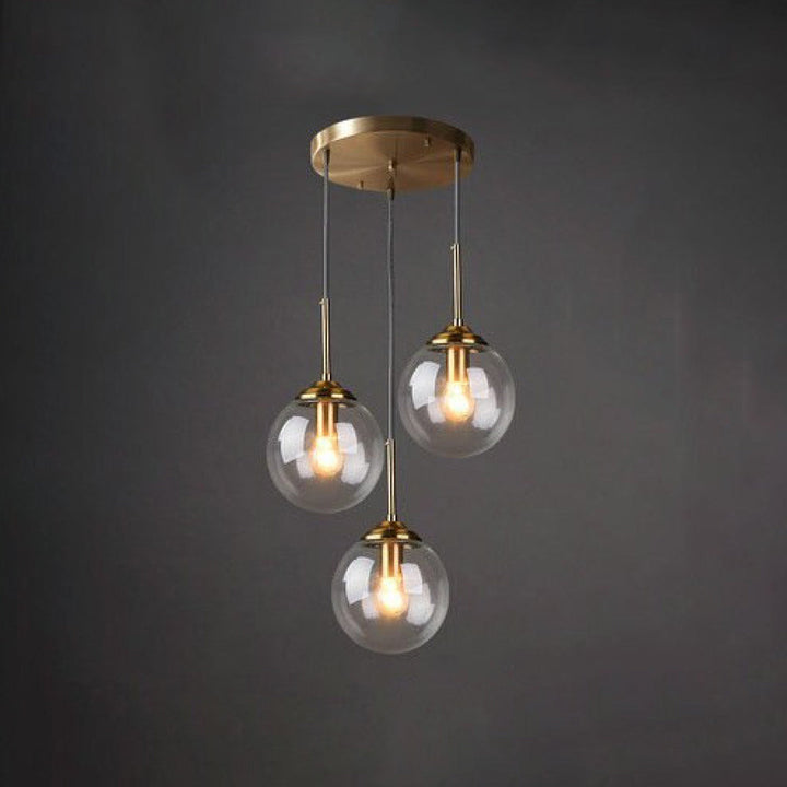 Modern 5-Light Globe Pendant Light with Smoked Glass and Brass Finish