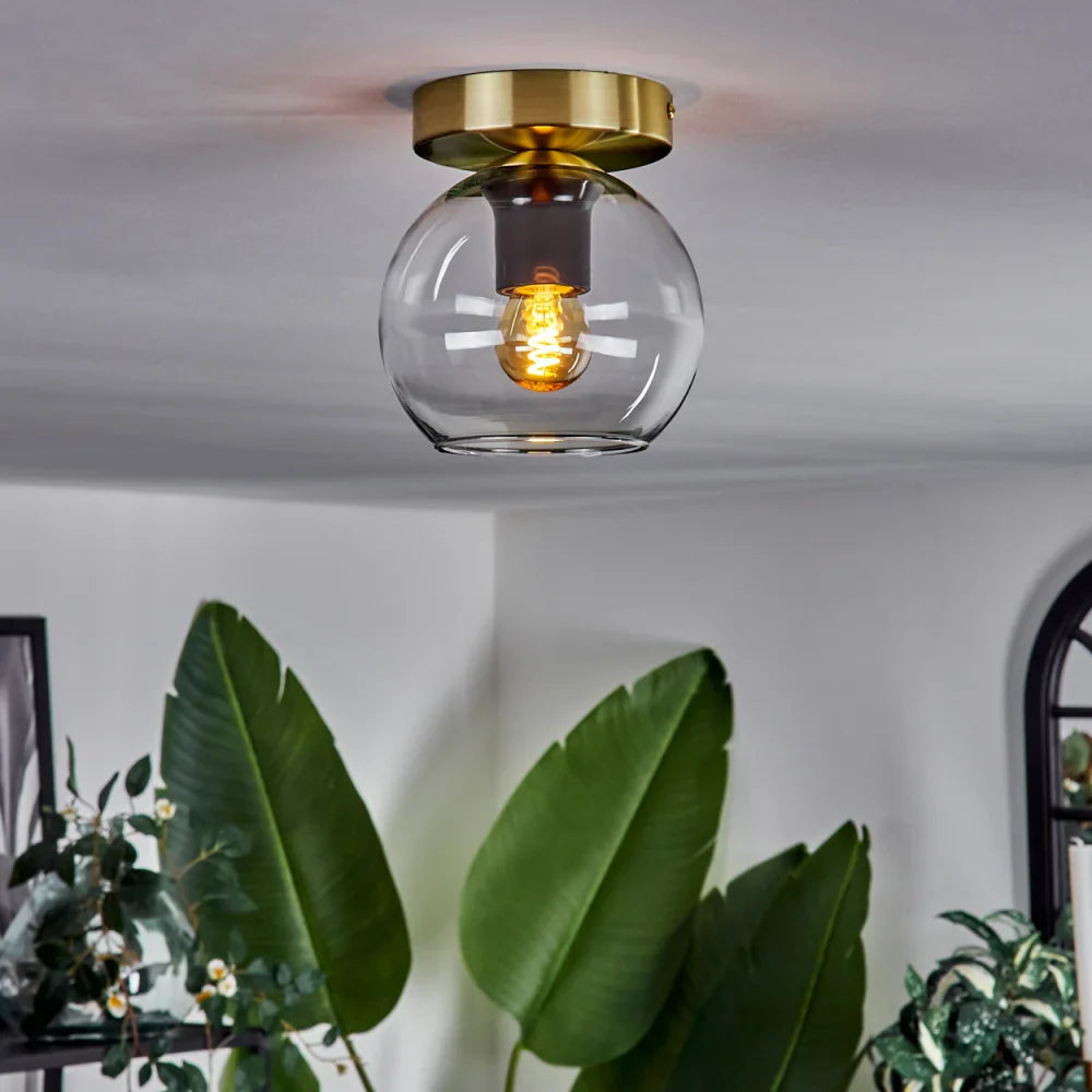 Modern Amber Glass Globe Ceiling Light with Brass Base