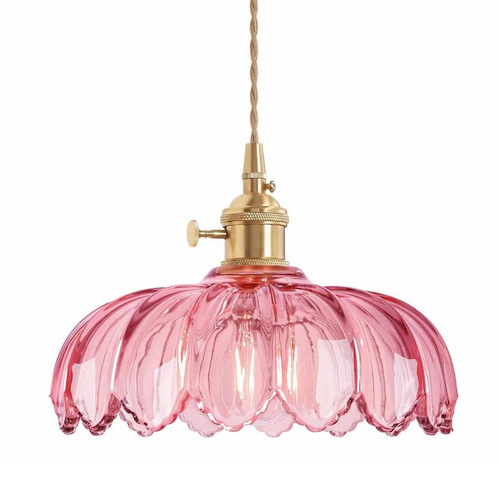 Pink scalloped glass pendant lamp with warm ambient light