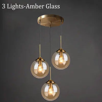 Modern 5-Light Globe Pendant Light with Smoked Glass and Brass Finish