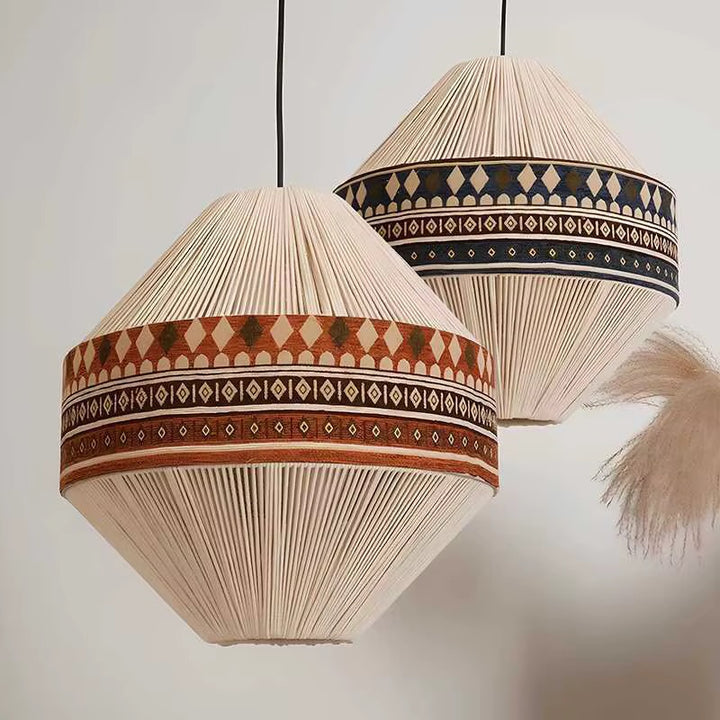 Pair of hanging pendant lights with ribbed cream shades and contrasting geometric patterned bands
