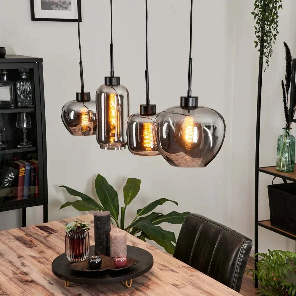 Modern Smoke Glass Pendant LightModern Smoke Glass Pendant Light Cluster with Mixed ShapesThis modern pendant light cluster features a unique arrangement of smoke glass shades in various shapes, each with an exposed filament bulb for a warm, ambient glow.Pendant LightingWadi Home