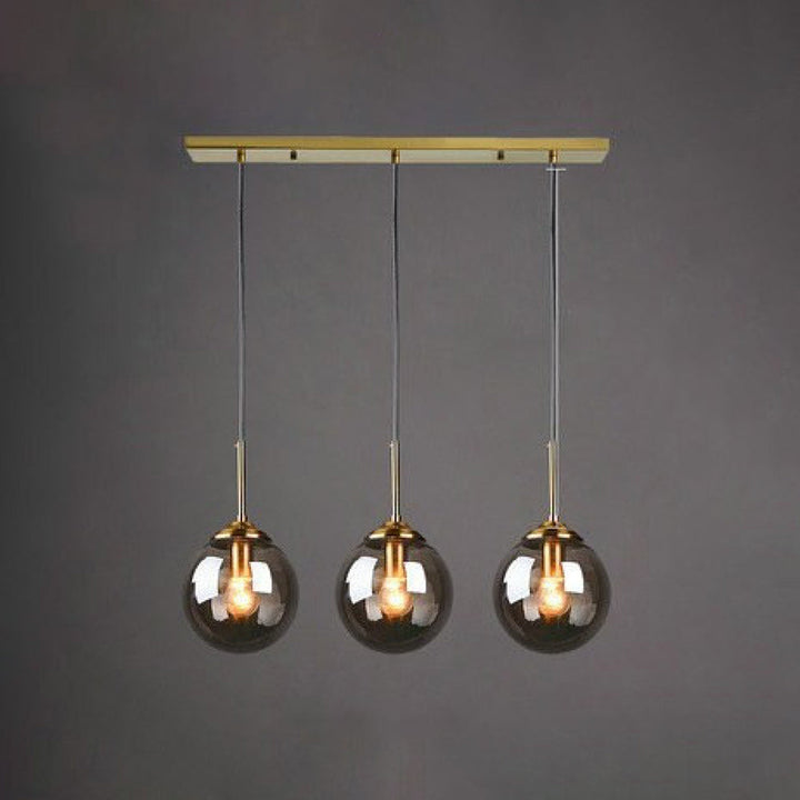 Modern 5-Light Globe Pendant Light with Smoked Glass and Brass Finish