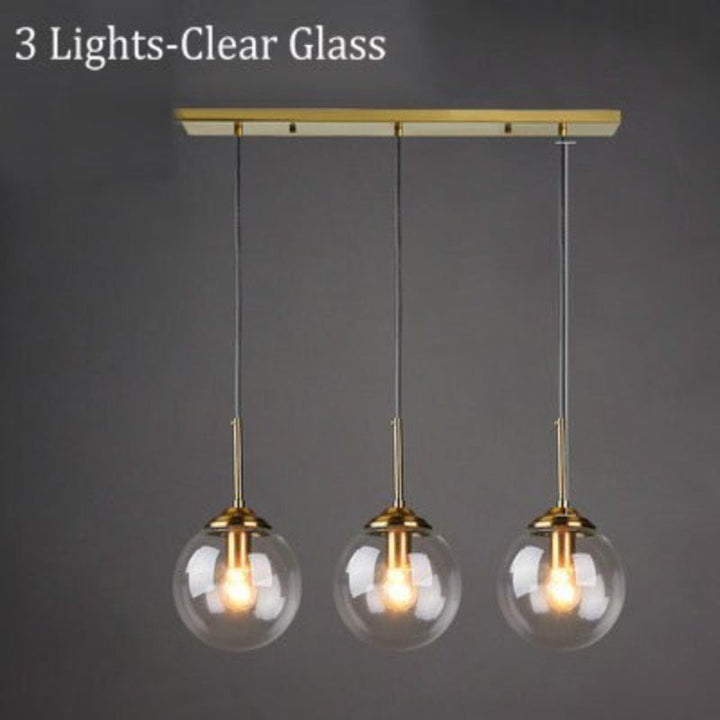 Modern 5-Light Globe Pendant Light with Smoked Glass and Brass Finish