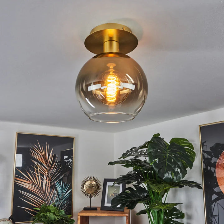 Modern Amber Glass Globe Ceiling Light with Brass Base