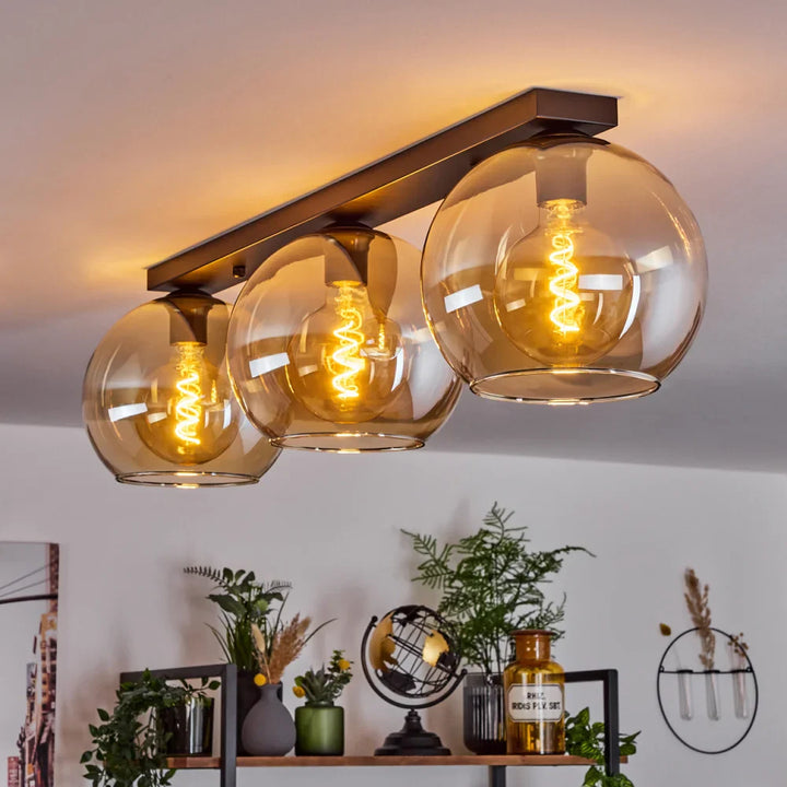 Modern Amber Glass Globe Ceiling Light - Triple Bar Design