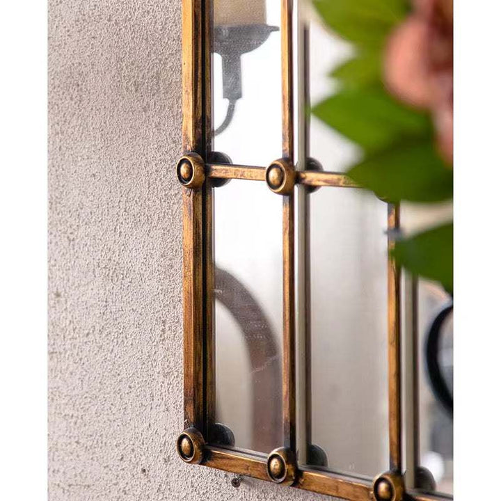 Arched Industrial Grid Mirror with Brass Accents