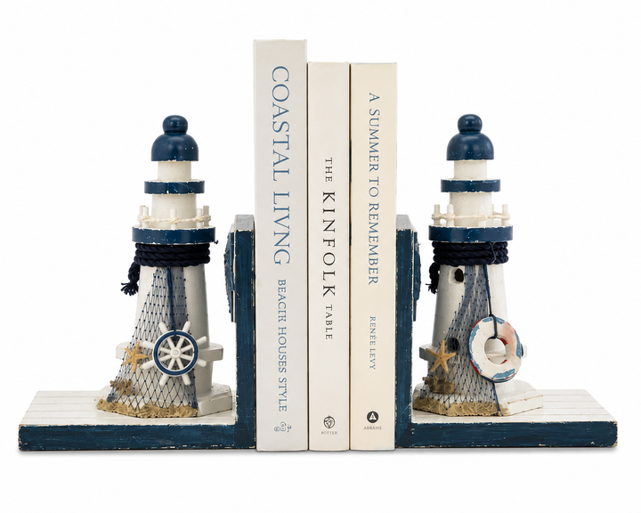Pair of wooden lighthouse bookends with coastal nautical decorations in blue and white.