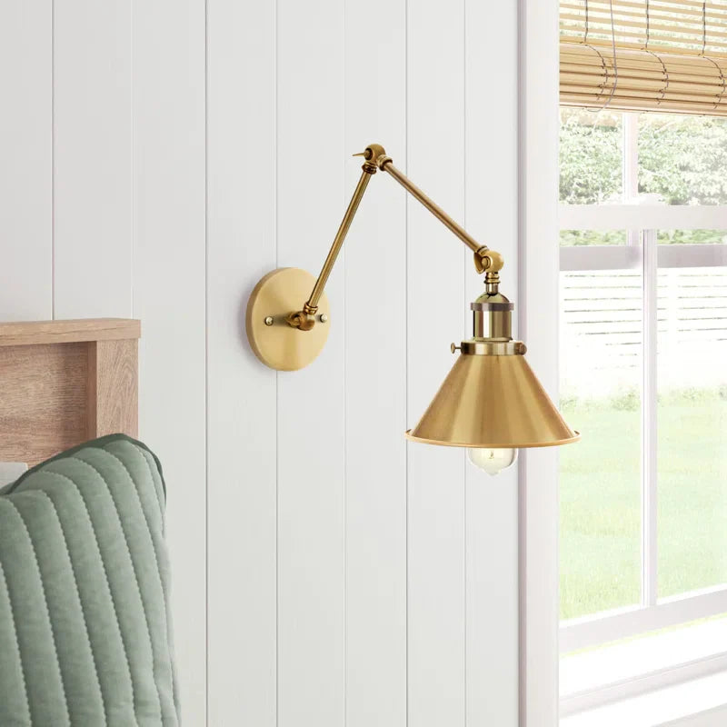 Industrial Wall Sconce with Extended Adjustable Arm in Brass Finish