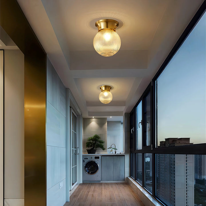 Vintage Brass Flush-Mount Ceiling Light with Textured Glass Globe