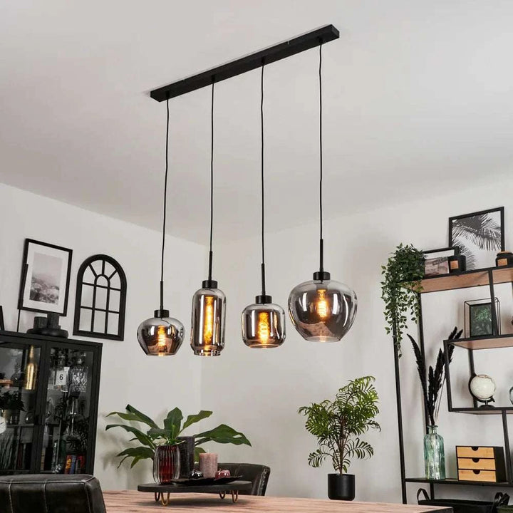 Modern Smoke Glass Pendant LightModern Smoke Glass Pendant Light Cluster with Mixed ShapesThis modern pendant light cluster features a unique arrangement of smoke glass shades in various shapes, each with an exposed filament bulb for a warm, ambient glow.Pendant LightingWadi Home