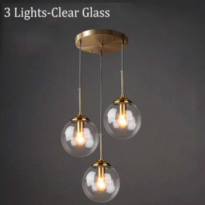 Modern 5-Light Globe Pendant Light with Smoked Glass and Brass Finish