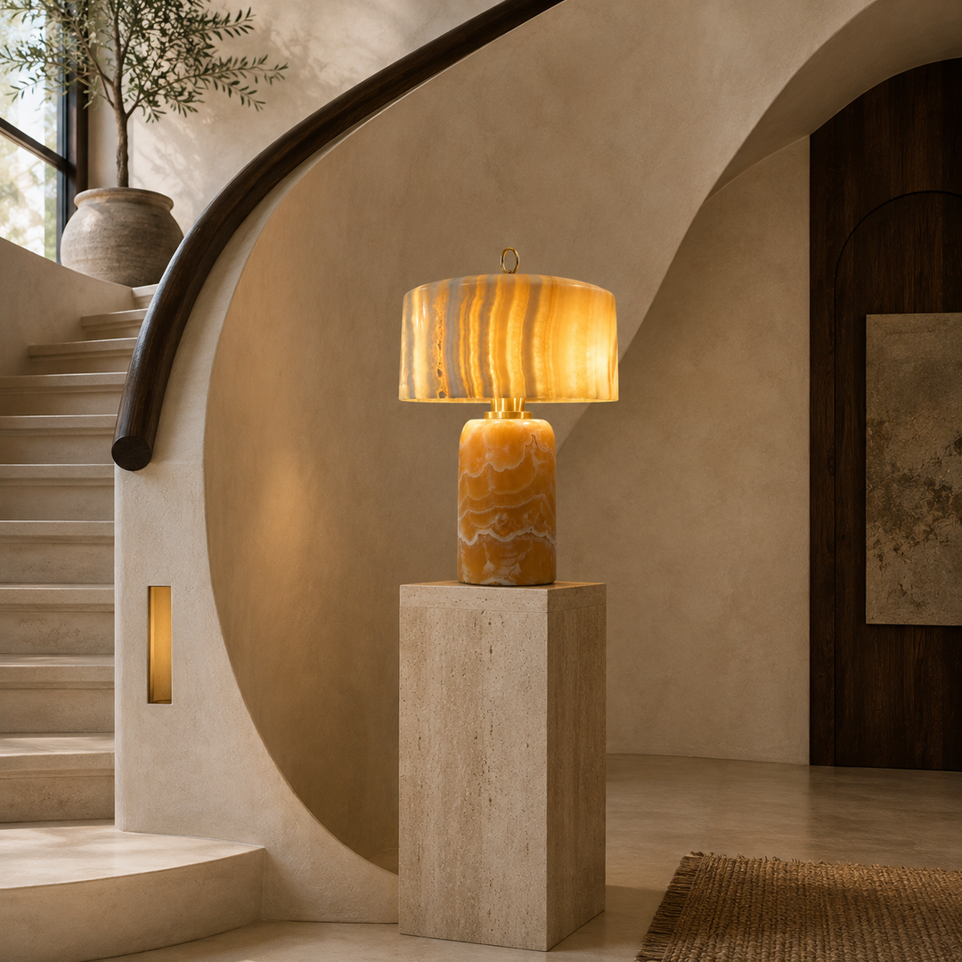 Modern amber onyx table lamp with a glowing translucent stone-effect shade and sculptural veined base