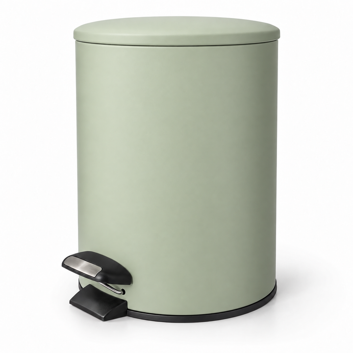 Sage green round metal pedal bin with black foot pedal and lid