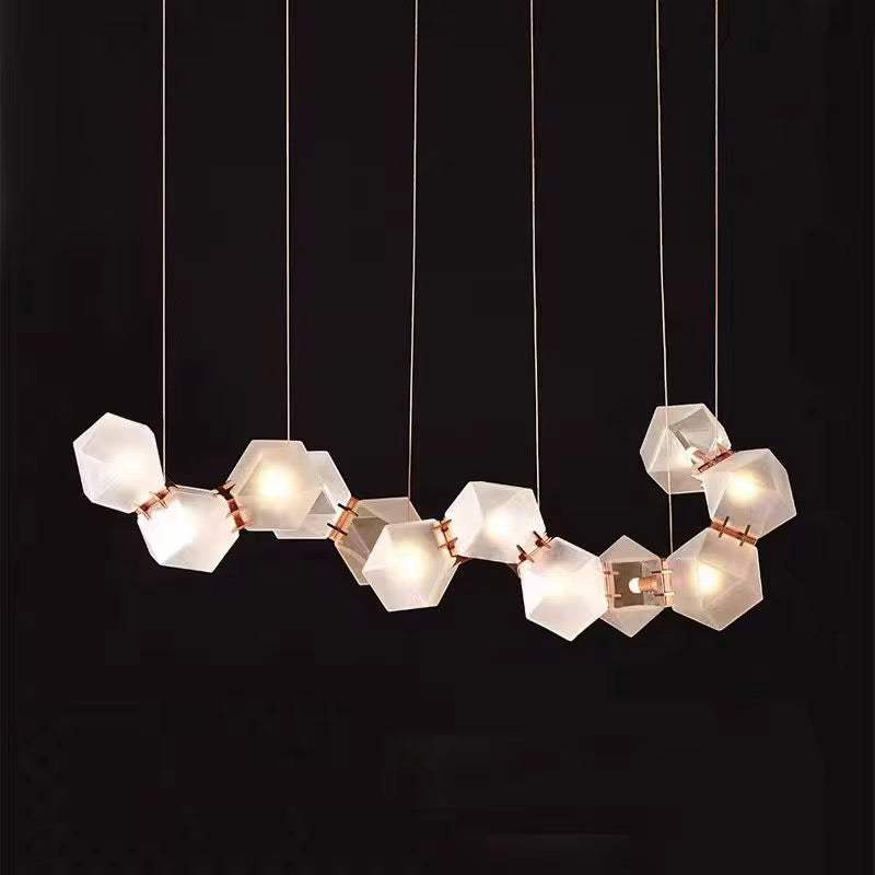 Modern Geometric Pendant LightModern Geometric Pendant Light for Dining Room (8 cells)Illuminate your dining area with this striking modern geometric pendant light, featuring a unique configuration of frosted hexagonal glass shades. Designed to add elPendant LightingWadi Home