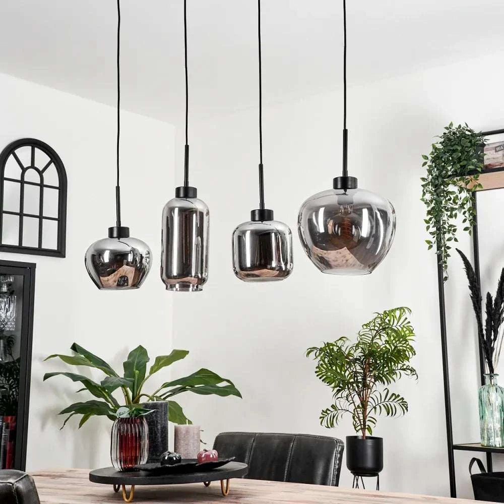 Modern Smoke Glass Pendant LightModern Smoke Glass Pendant Light Cluster with Mixed ShapesThis modern pendant light cluster features a unique arrangement of smoke glass shades in various shapes, each with an exposed filament bulb for a warm, ambient glow.Pendant LightingWadi Home