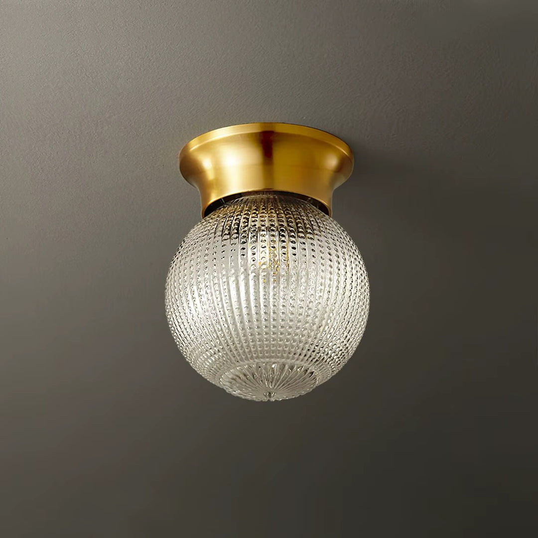 Vintage Brass Flush-Mount Ceiling Light with Textured Glass Globe