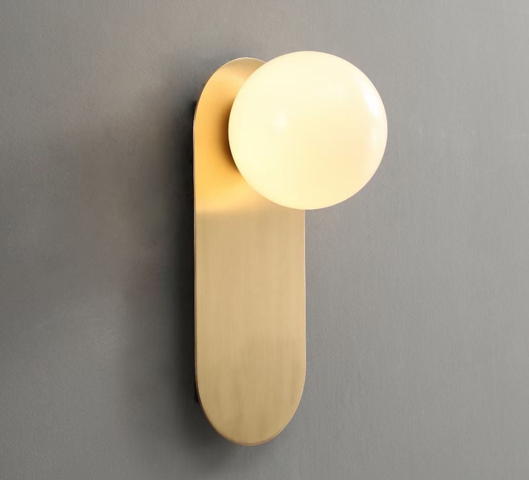 Modern Minimalist Wall Light with Soft Gold Base and Globe Shade