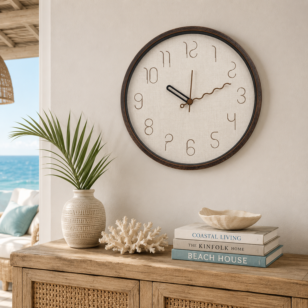 Round dark wood wall clock with minimalist dial and coastal modern design.