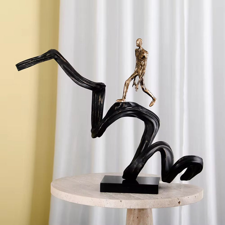 Abstract Walking Figure on Wave Sculpture