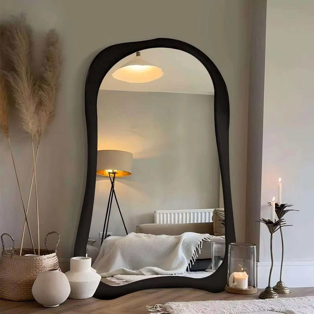 Organic Shape Floor Mirror with black minimalist frame and free-form silhouette for modern bedrooms and dressing areas