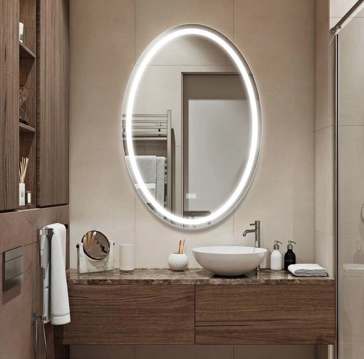 Bathroom vanity with a round illuminated mirror, sink, and various toiletries.