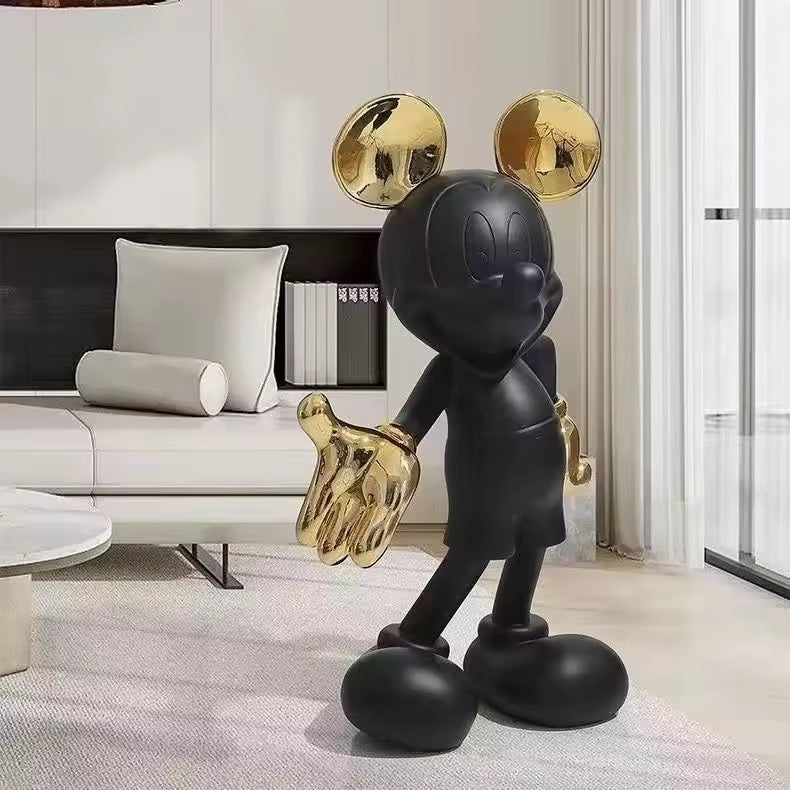 Modern black gold figurines adding bold artistic statement to interiors