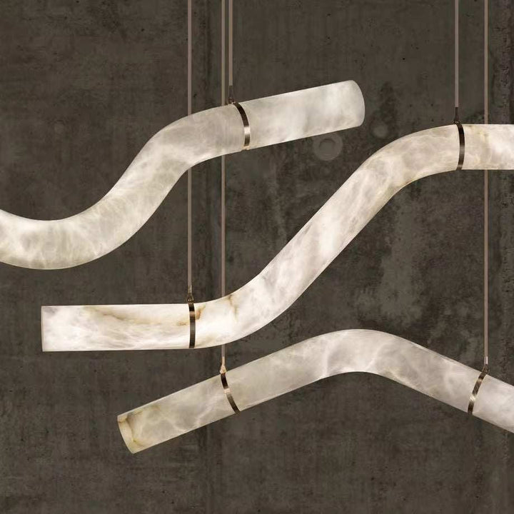 Wave marble pendant light with artistic wave-shaped design and bold visual statement