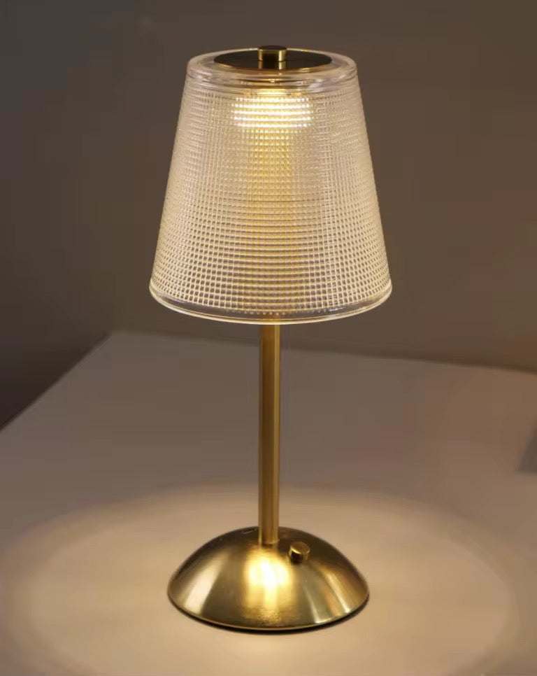 Frosted Shade GoldFrosted Shade Gold rechargeable Table LampModern table lamp with a frosted textured shade and sleek gold base, creating a cozy ambient light ideal for bedrooms or living rooms.Table LampsWadi Home