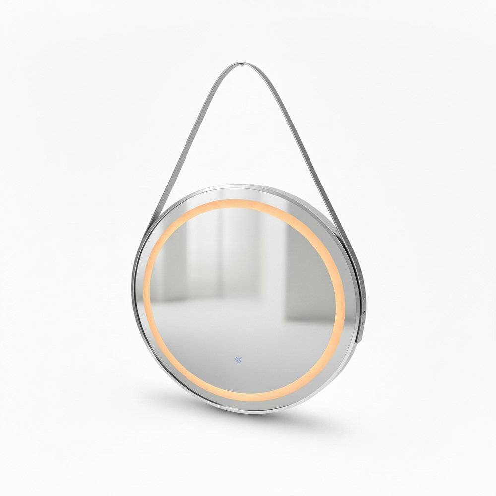 Round mirror with a metallic frame and hanging strap on a white background