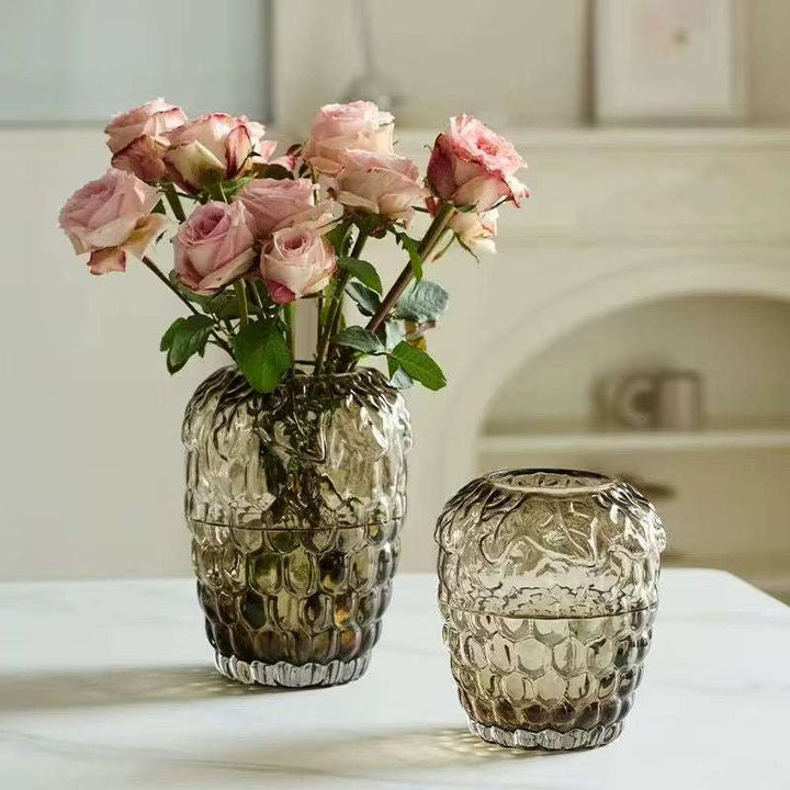 Set of textured glass decorative vases with smoky finish and organic sculptural design