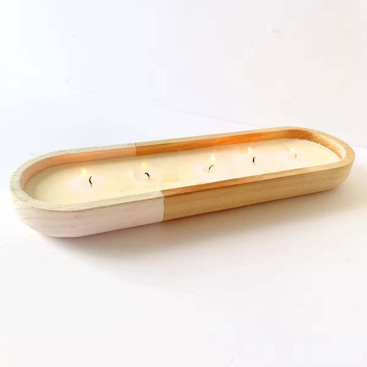 Citronella wooden scented candle in wooden oval tray with white accents and multiple wicks for outdoor use