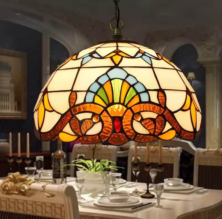 Vintage Tiffany pendant with stained glass design and warm vintage ambiance