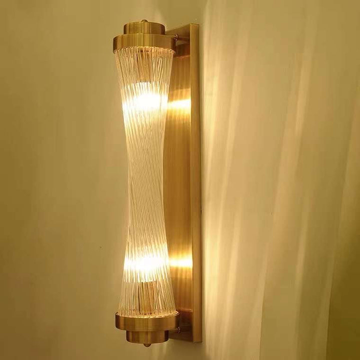 Modern Gold Wall Sconce with Glass Filament Design