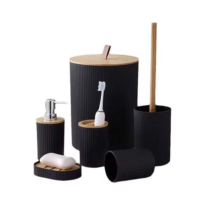 Matte black ribbed bathroom organizer set with bamboo accents