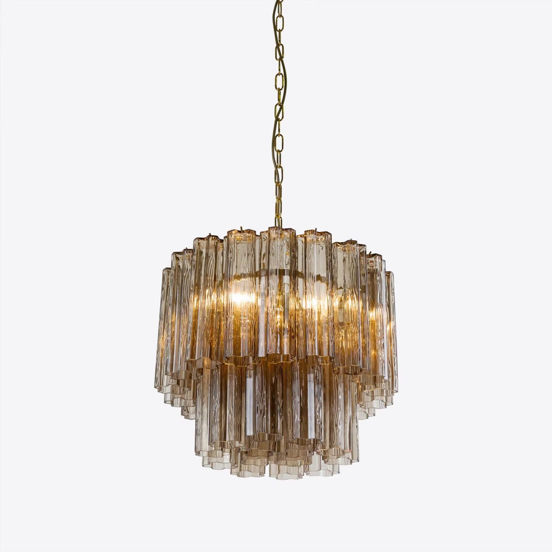 Tiered amber glass chandelier with brass finish and hanging chain