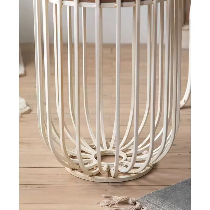 White woven basket on a wooden floor