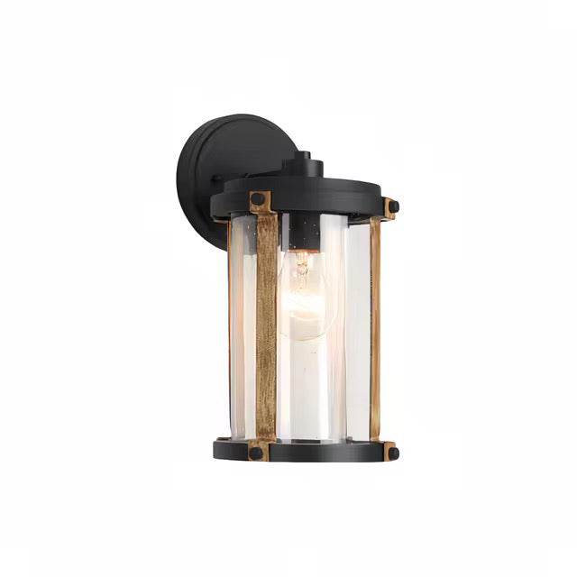 Industrial black outdoor wall light with brass accents and clear glass panels