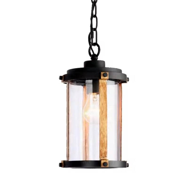 Black & Brass Hanging Outdoor Lantern with clear glass and industrial design for patios